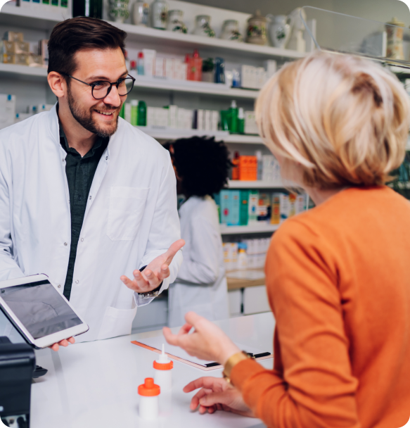 pharmacist talking to woman