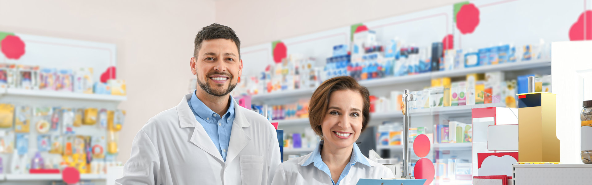 two pharmacist smiling